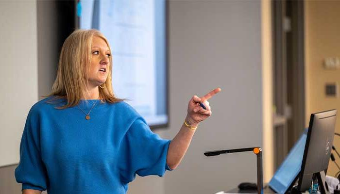 Sarah teaching at Accounting 250 class